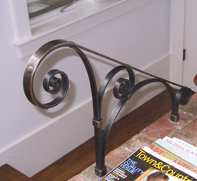 Iron hand rail with bronze cap